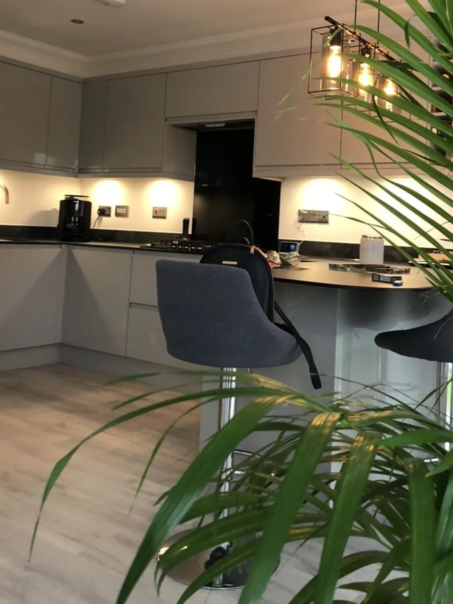 Kitchen sockets on the splashback and under-cabinet lights, fitted by an electrician in Renfrewshire